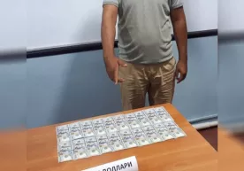 Жиззахда фуқарони ўқишга киритиб қўйиш эвазига 400 доллар сўраган ўқитувчи ушланди фото