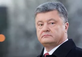 Порошенко: Путин Украинани рус рангларига бўямоқчи фото