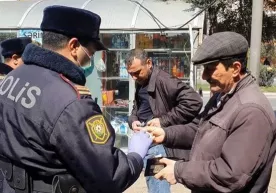 Озарбайжонда уйдан чиқиш учун SMS юбориш тартиби жорий этилди фото
