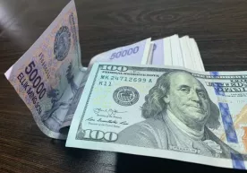 O‘zbekistonda dollarning rasmiy kursi qatorasiga uchinchi kun pastladi фото
