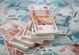 Қозоғистонликлар оммавий тарзда рублни сотиб олишга тушиб кетдилар фото