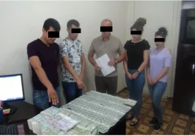 Valyuta oldi-sotdisi bilan shugʻullangan yana bir uyushgan jinoiy guruh qoʻlga olindi фото
