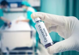 Хитойлик олимлар COVID-19 вакцинаси синовдан ўтганини эълон қилишди фото