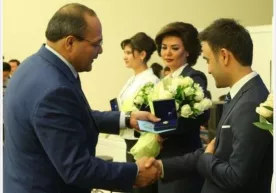 Хонанда Шоҳруххон ва бошловчи Нилуфар Сотиболдиева кўкрак нишони билан тақдирланди фото