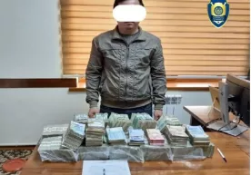 Сурхондарёда «азарт»га берилиб ўзгалар пулини ўйинга тиккан Халқ банки кассири ушланди фото