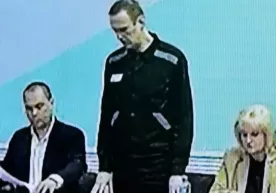 Навалнийга «экстремистик иш» бўйича 20 йил қамоқ сўралди фото