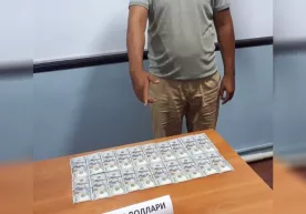 Жиззахда фуқарони ўқишга киритиб қўйиш эвазига 400 доллар сўраган ўқитувчи ушланди фото