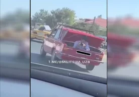 Ҳайдовчи «Жигули» юкхонасига Malibu’ни видеога олиш учун тасвирчини жойлаштирди... фото
