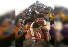 Hindistonlik juftlik samolyot bortida to‘y uyushtirdi (video) фото