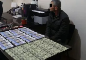 Qalbaki so‘m va dollarlar yasagan shaxs qo‘lga olindi фото