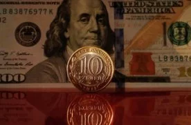 Россияда доллар курси 2014 йилнинг декабридан буён илк марта 77 рублдан ошди фото