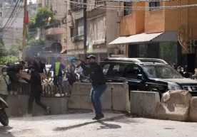 Bayrut markazida norozilik namoyishlari qonli otishma bilan yakunlandi фото