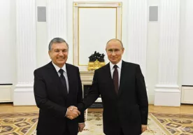 Мирзиёевнинг Путинга орден бергани фаоллар нигоҳида фото