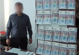 Бухорода темир йўл бекати бошлиғи пора олаётганида ушланди фото