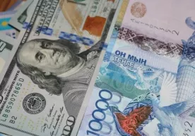 Қозоғистонда доллар курси янги тарихий рекорд қайд қилиб, 300 тангадан ошди фото
