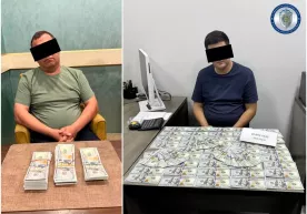 Ички ишларнинг икки мансабдори катта миқдорда пора билан ушланди фото