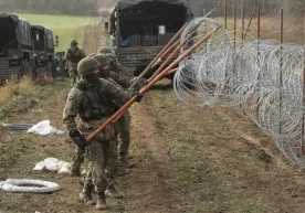 Полша миграция инқирози хавфи сабаб Россия билан чегарада девор қурмоқчи фото