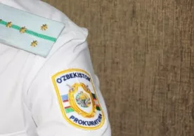 Prokuratura xodimiga 10 ming dollar pora bergan shaxs ushlandi фото