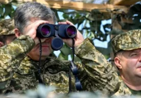 Poroshenko: Rossiya bilan "keng miqyosli urush" xavfi haqida фото