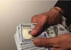 Oltiariqda kadastr xodimi 30 ming AQSh dollari talab qildi фото