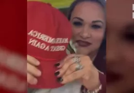 АҚШдаги ресторанда аёл Трамп кепкасидаги эркакка ташланди (видео) фото
