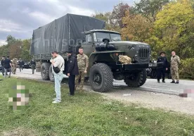 Чеченистонда рус аскарларини олиб кетаётган юк машинаси ўққа тутилди фото