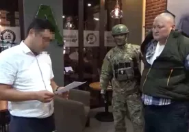 Qirg‘iziston prezidenti yordamchisidan qiymati 300 ming dollarga teng 12 ta bitkoin undirishdi фото