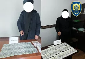 Asaka va Yangiqo‘rg‘onda dollar ayirboshlayotganlar qo‘lga olindi фото