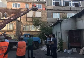 Кўп қаватли уйлар атрофидаги ер майдонлари кимники? фото