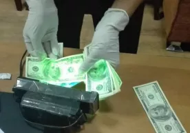 Oliy taʼlim vazirligi xodimi 3 ming AQSH dollari olayotgan paytda qoʻlga tushdi (foto) фото