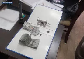 Qarshi tumani prokuraturasi tergovchisi pora olayotganda ushlandi фото