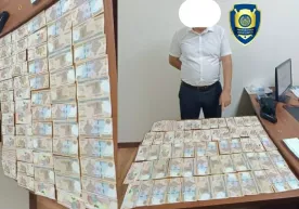 Банкнинг шўъба мудири пора олаётганда қўлга тушди фото