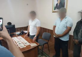 Қашқадарёда фуқародан 1 200 доллар олган МИБ ходимлари ушланди фото