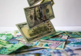 Қозоғистонда нақд валютани мамлакатдан олиб чиқишга чеклов ўрнатилди фото
