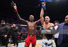 UFC 293. Стрикленд Адесаняни мағлуб этиб, ўрта вазн тоифаси чемпионига айланди фото