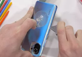 Таниқли «устабузармон» яп-янги «Xiaomi Mi 11»ни ёриб кўрди (видео) фото