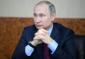 Путин ўзи бўлган вертолёт Чеченистонда ўққа тутилганини эслади фото