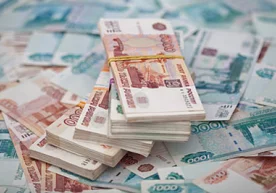 Қозоғистонликлар оммавий тарзда рублни сотиб олишга тушиб кетдилар фото