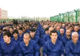 Хитой қамоққа ташлаган 1 млн мусулмон бахтли яшаяптими? (видео) фото