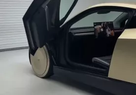 Tesla kompaniyasi rulsiz elektromobilni ommaga taqdim etdi фото