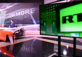 АҚШ ҳукумати RT телеканалини Россия разведкаси учун ишлаганликда айблади фото