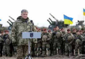 Украинада ҳарбий ҳолат жорий этилмоқда фото