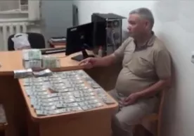 Наманган вилояти собиқ прокурори 50 минг доллар пора билан қўлга олинди фото