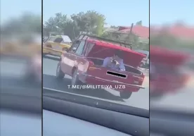 Ҳайдовчи «Жигули» юкхонасига Malibu’ни видеога олиш учун тасвирчини жойлаштирди... фото