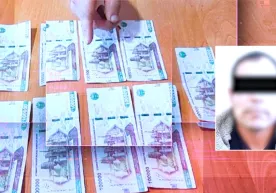 Angrenda qalbaki pul tayyorlab sotgan shaxslar qo‘lga olindi фото