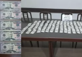 Namanganda qalbaki 8300 dollarni sotishga uringan shaxs ushlandi фото