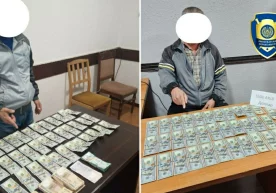 Андижонда долларни сўмга ноқонуний айирбошлаган «валютчиклар» ушланди фото