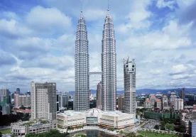 The Petronas twin towers were painted in the colors of the flag of Uzbekistan фото