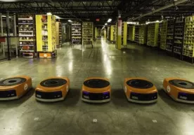 Amazon xodimlar sonini qisqartirmay 15 ming robotni ishga tushirdi фото