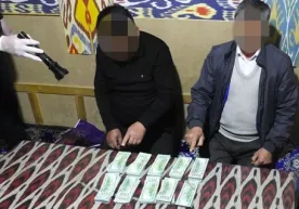Оҳангарон тумани ҳокимлиги ходими 20 минг доллар билан ушланди фото